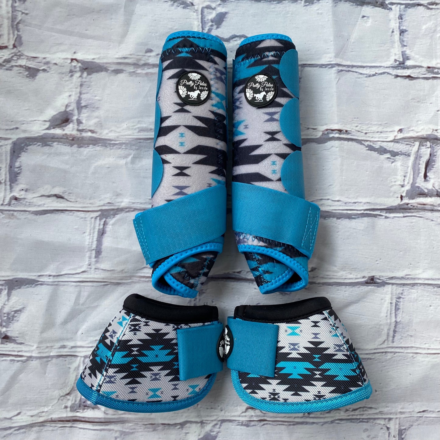 <transcy>Teal Aztec • Boots and Bells</transcy>